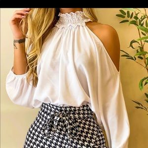 White blouse uncovered shoulders